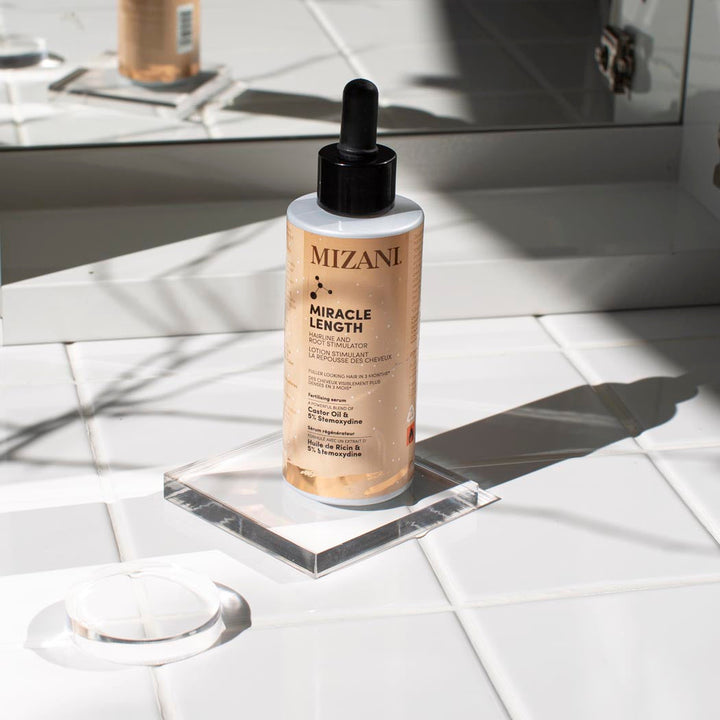 https://www.arcstore.co.za/Files/Images/Ecom/Brands/MNO/Mizani/115505_90ML_E.jpg